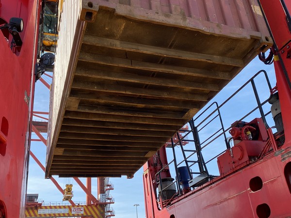 Underside check during a container lift